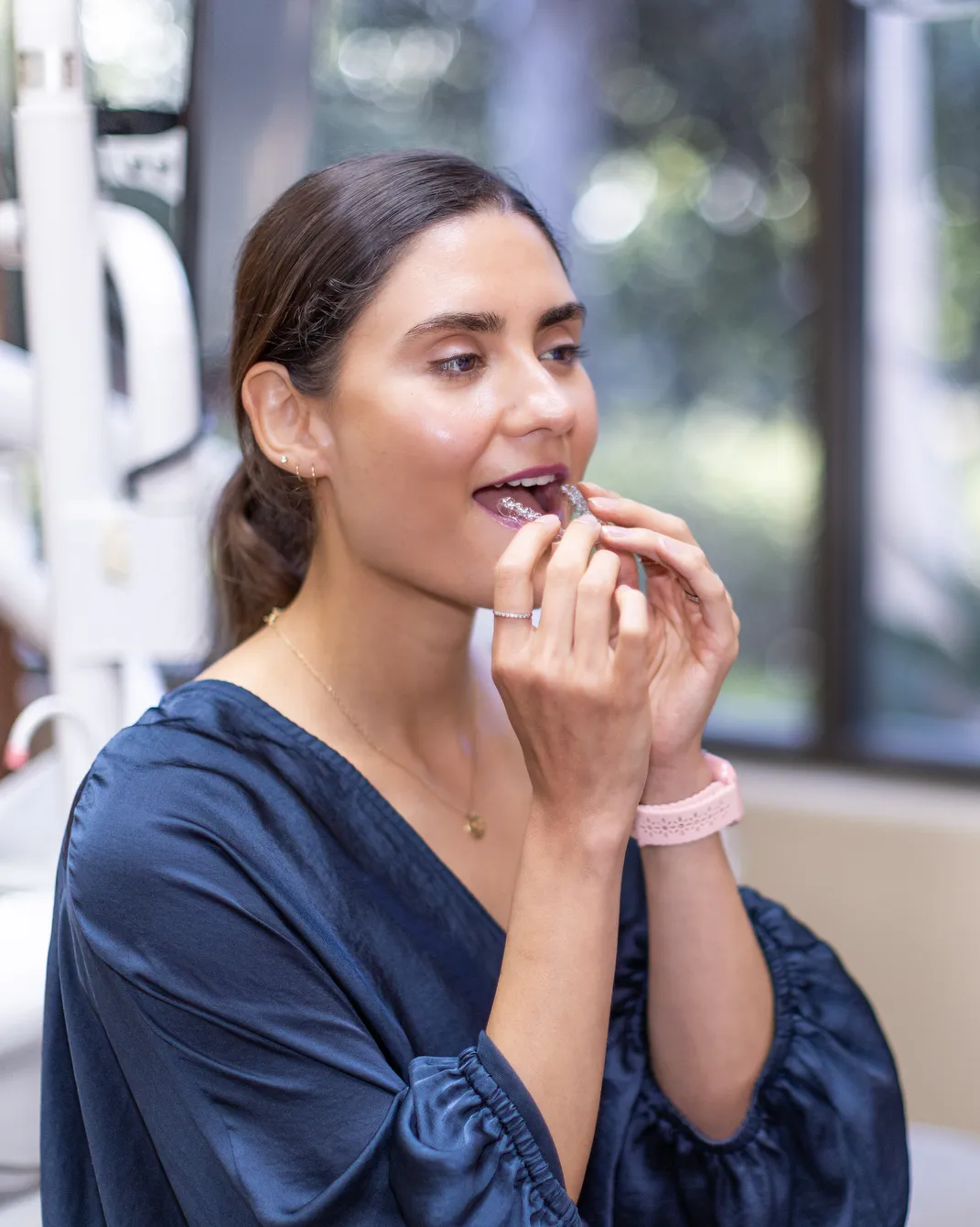 A patient fitting a clear aligner