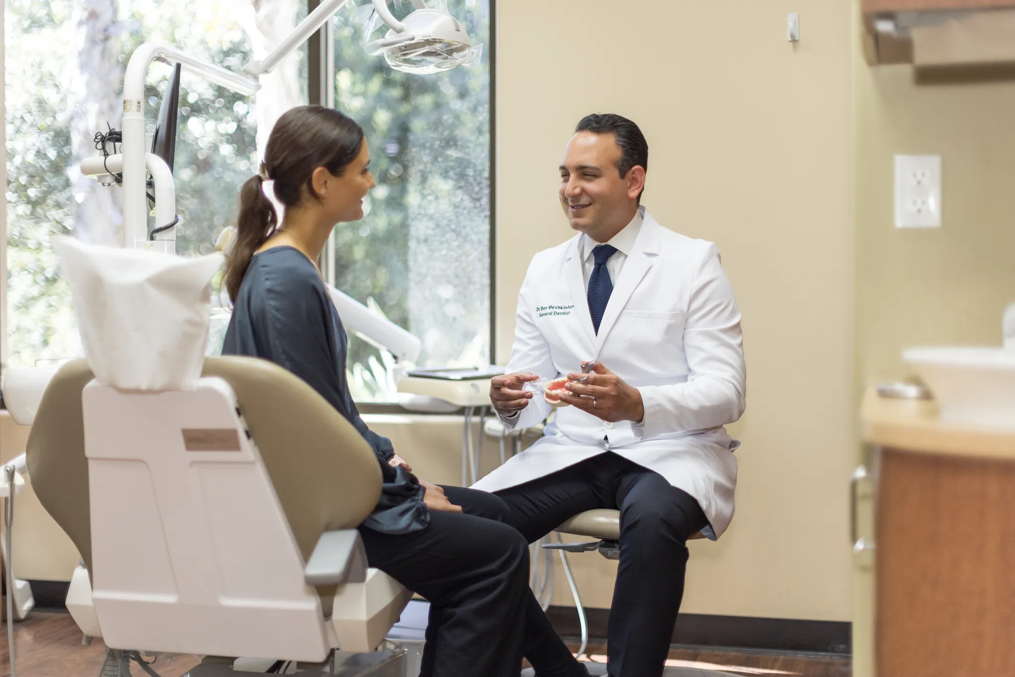 Dr. Ben examining a patient
