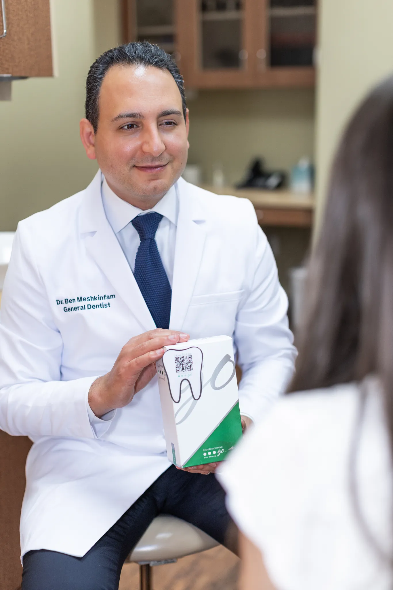 Dr. Ben fitting a clear aligner