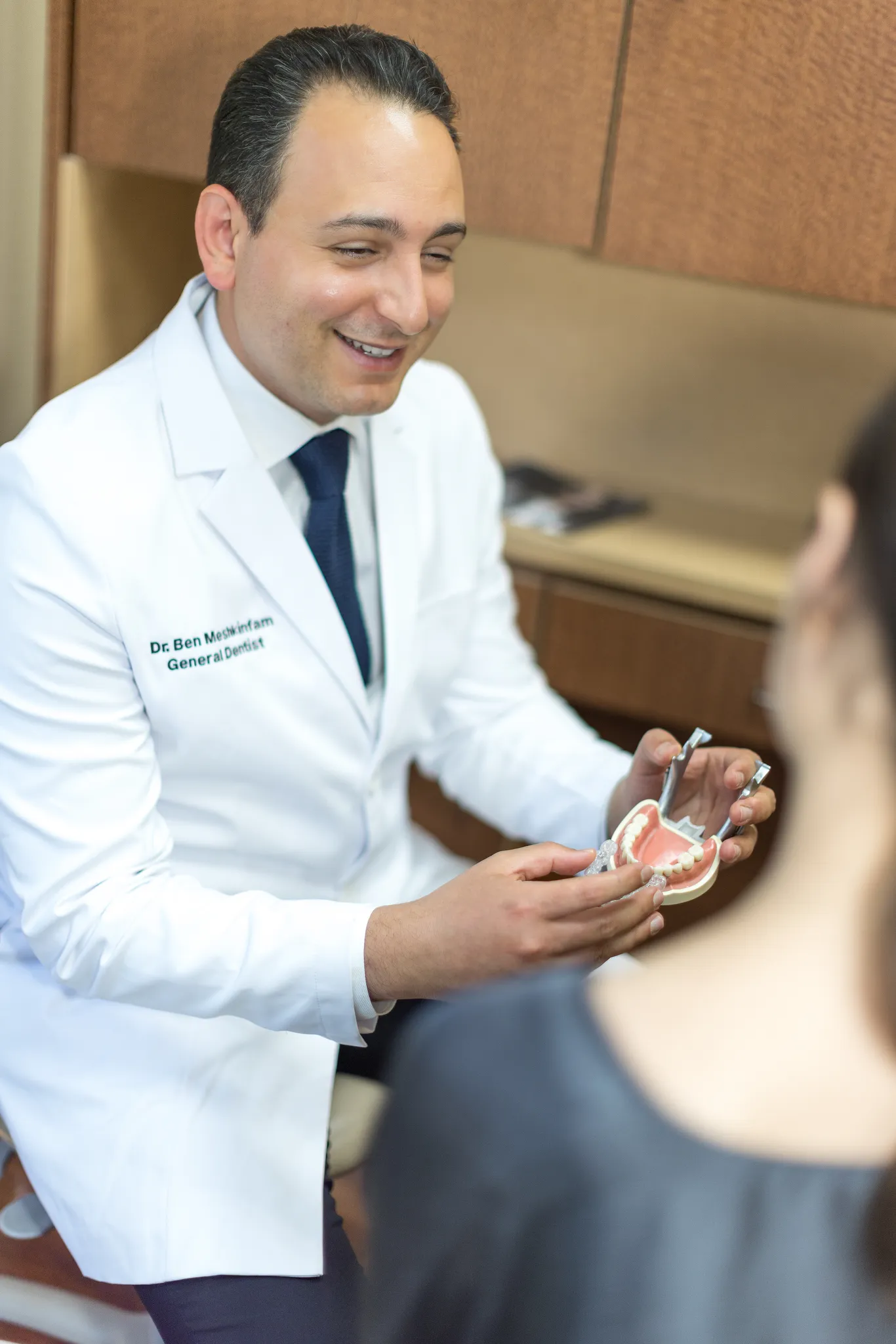 Dr. Ben talking through a tooth model